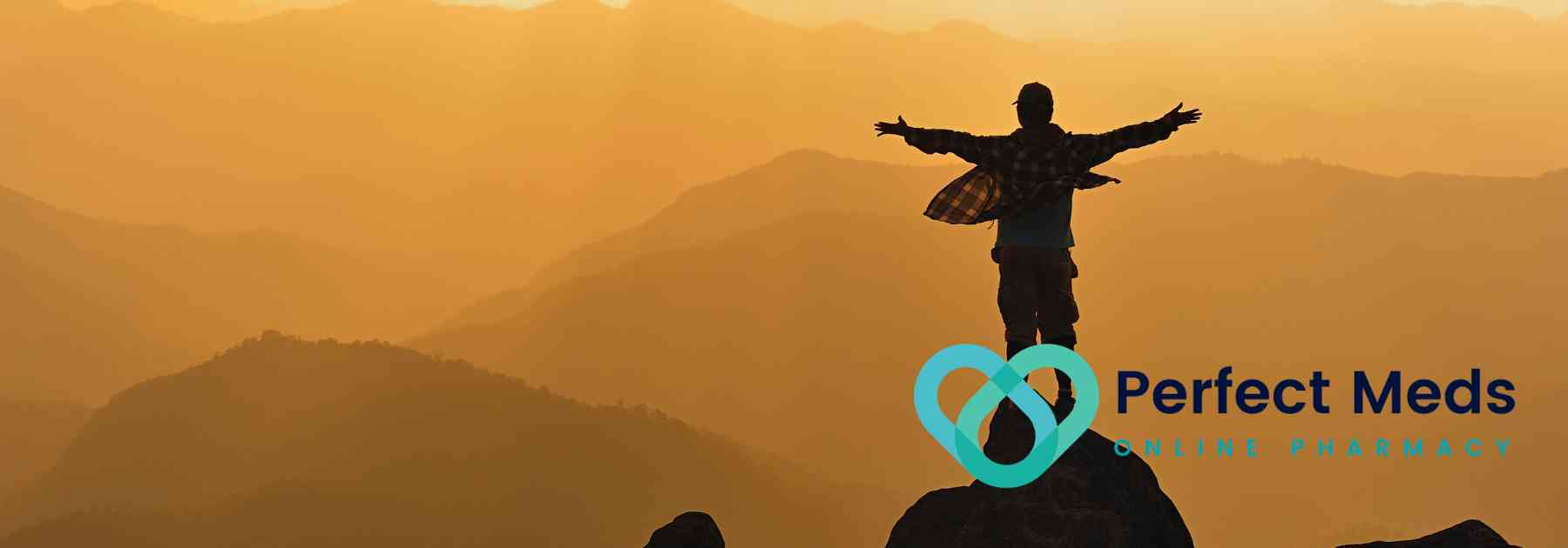 traveller standing with arms outstretched admiring view of mountains
