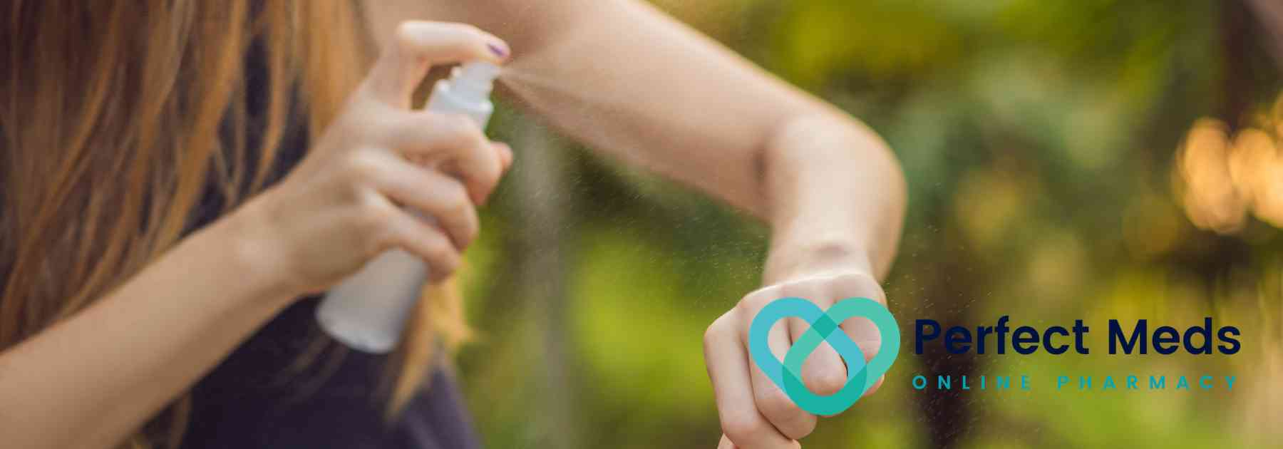 woman spraying insect repellent on her arm