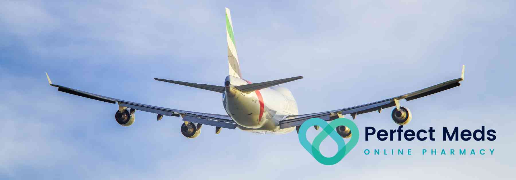 back view of plane flying in blue sky