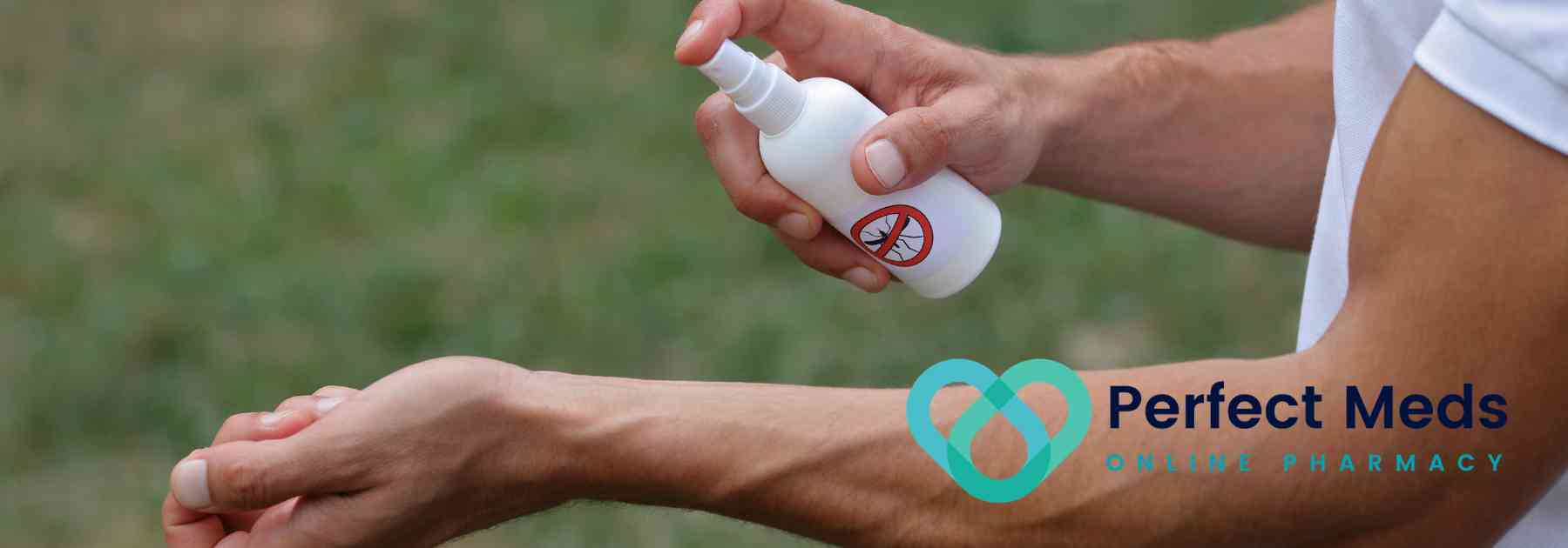 man spraying insect repellent on his arm