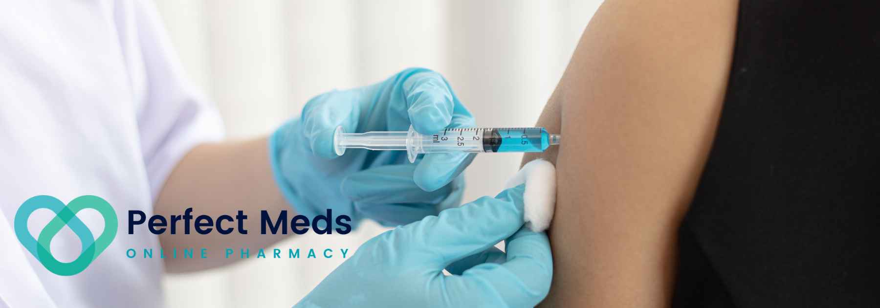person in black shirt receiving vaccine