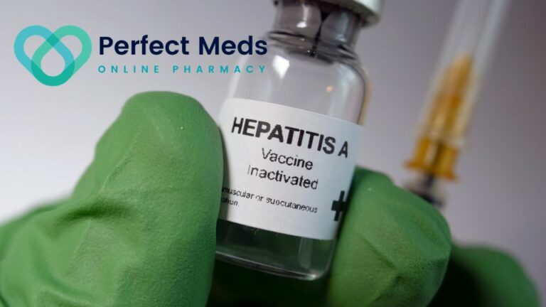 person wearing green medical glove holding hepatitis a vaccine