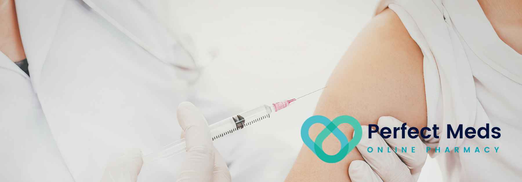 patient wearing white shirt receiving vaccine
