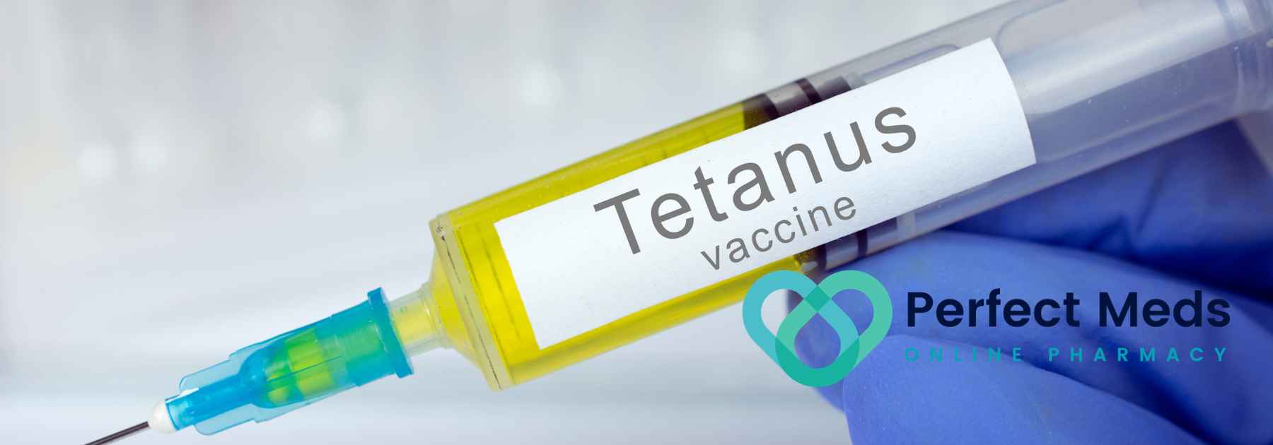 person wearing medical glove holding tetanus vaccine