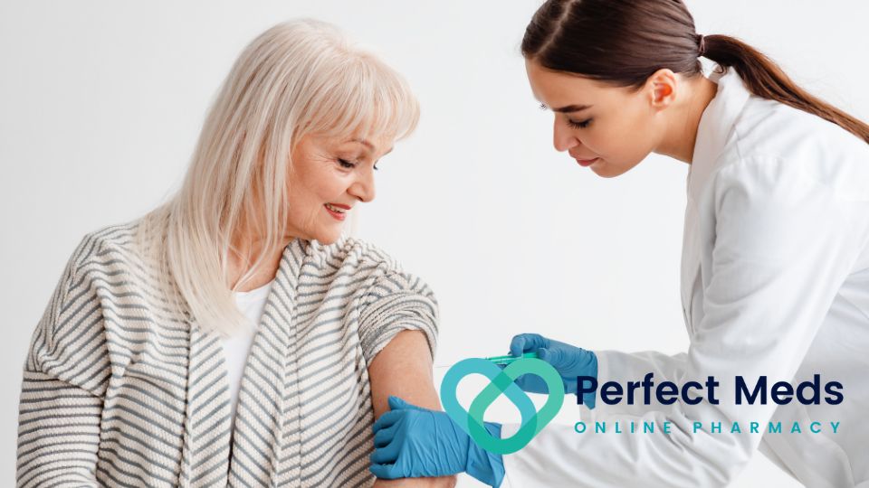 woman in striped cardigan receiving vaccine